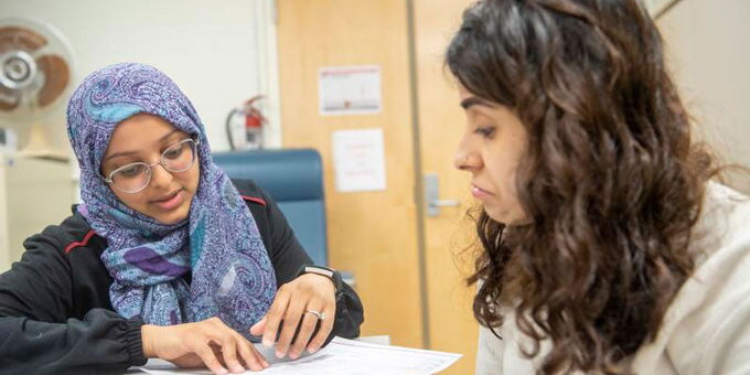 Two students working on an assignment together